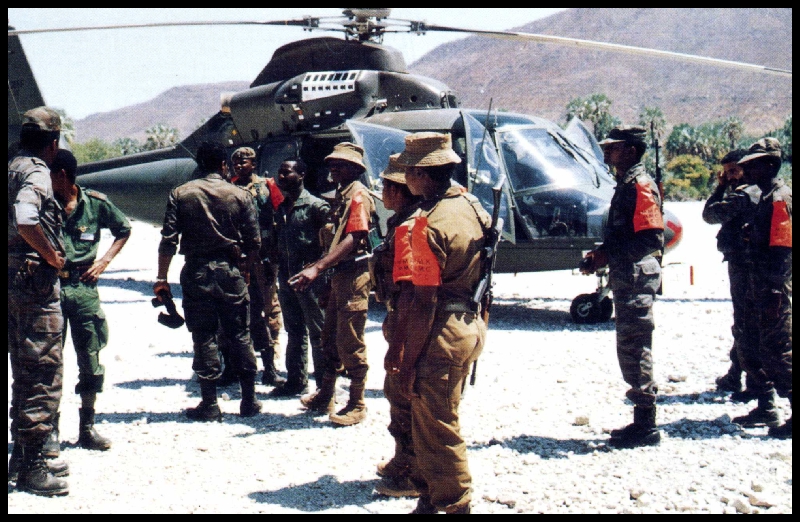 http://www.sadf.info/SWATF%20Pics/Members%20of%20the%20JMMC%20at%20a%20Cuban%20Helicopter.jpg